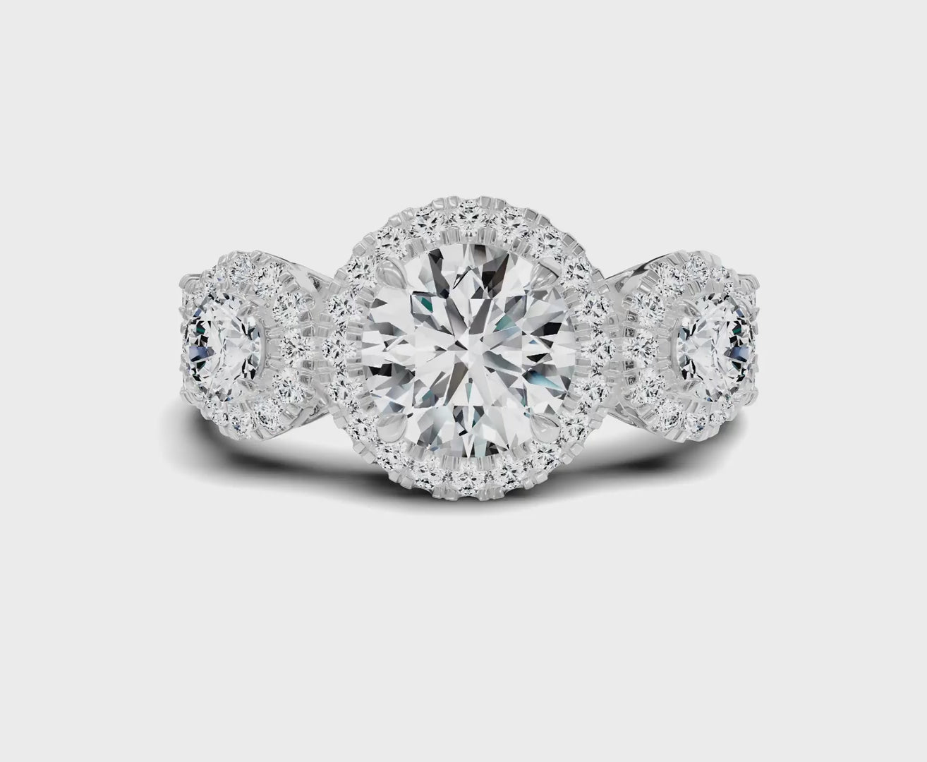 Halo Three Stone Engagement Ring with Round Brilliant Diamonds