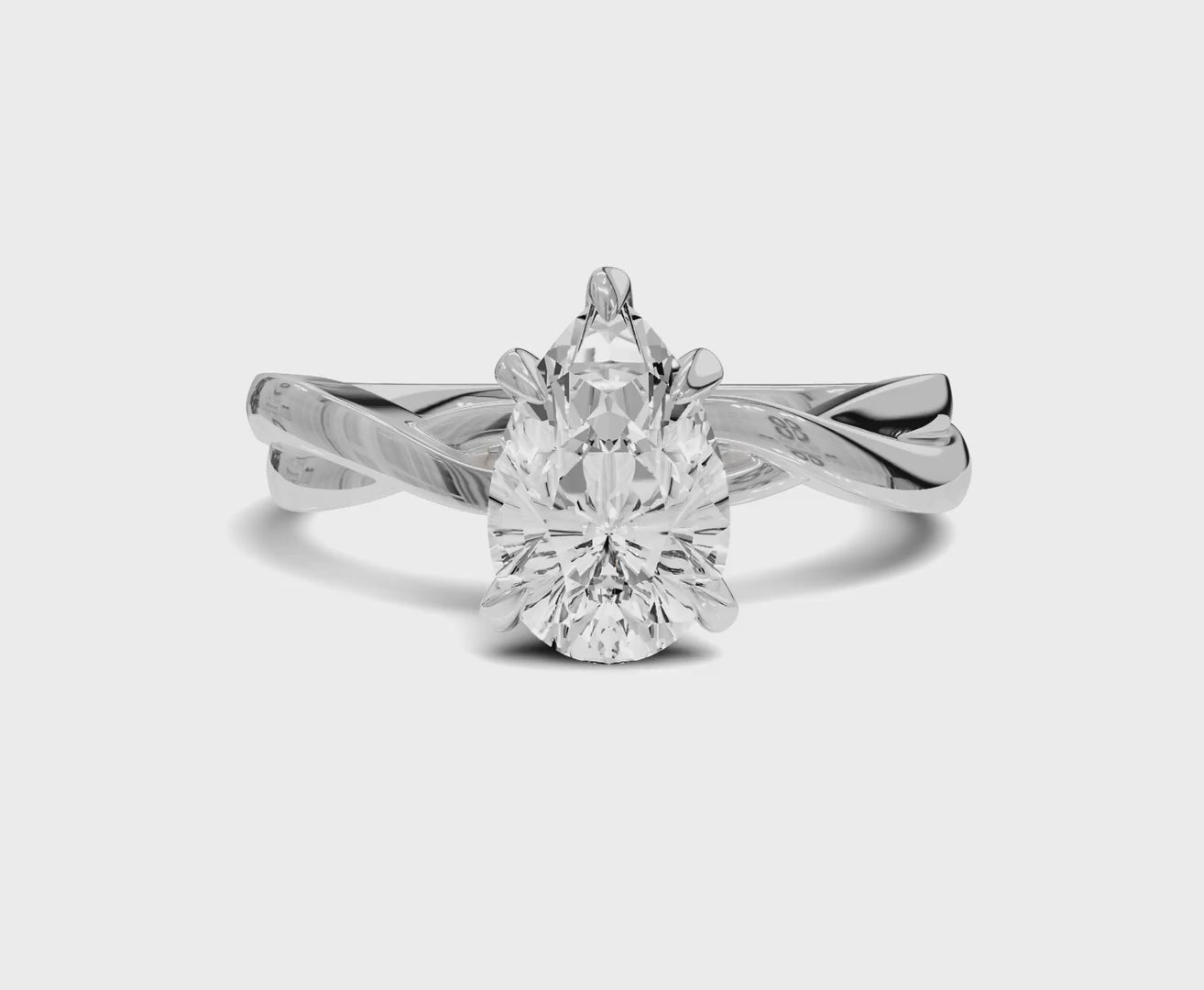 1.5 Ct Pear Diamond Twisted Shank Solitaire Engagement Ring