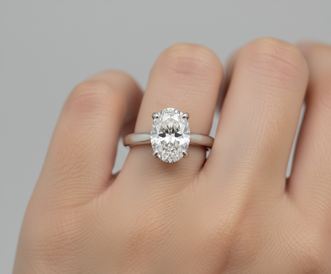 Oval 2 Ct. diamond engagement ring in 10k white gold with a sleek band and sparkling oval-cut center stone.
