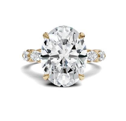 Diamond ring with a large central Oval Diamond and smaller stones