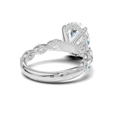 Diamond ring with a large central Oval Diamond and smaller stones